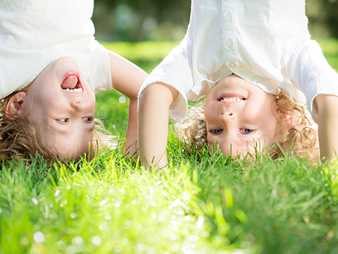 Child standing upside down